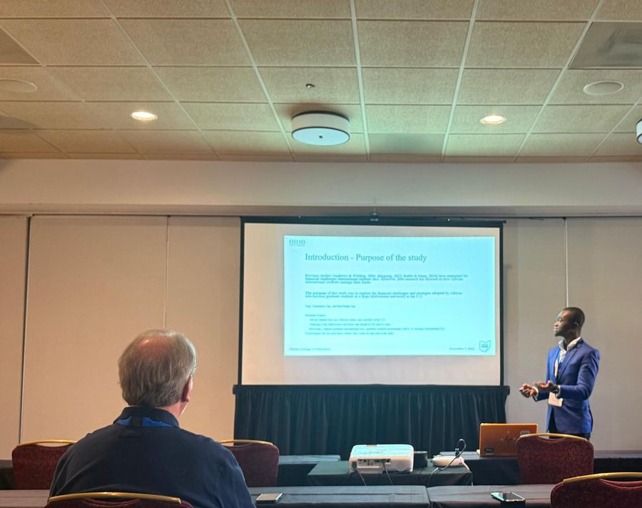 Bismark presenting research at a conference